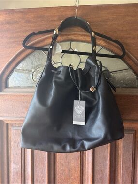 Vince Camuto Black Leather Drawstring Shoulder Bag with Gold Accents